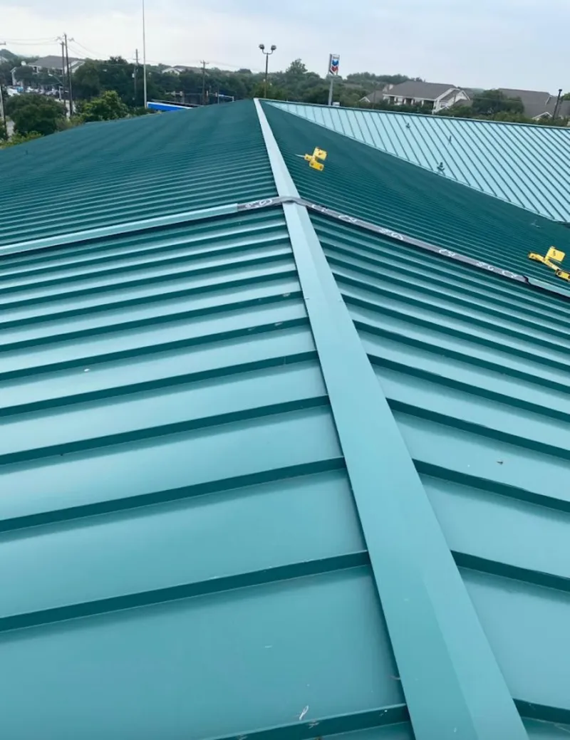 Green commercial metal roof ridge and valley for Metal Roof Repair in Walled Lake