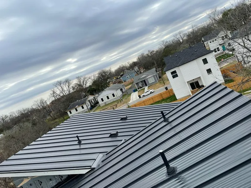 Standing seam metal roof panels with vents for Skylight Repair in Walled Lake
